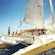 Guests relax on a catamaran